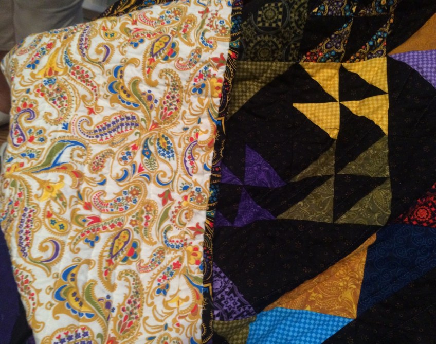 Pieced Quilt with Paisley Backing